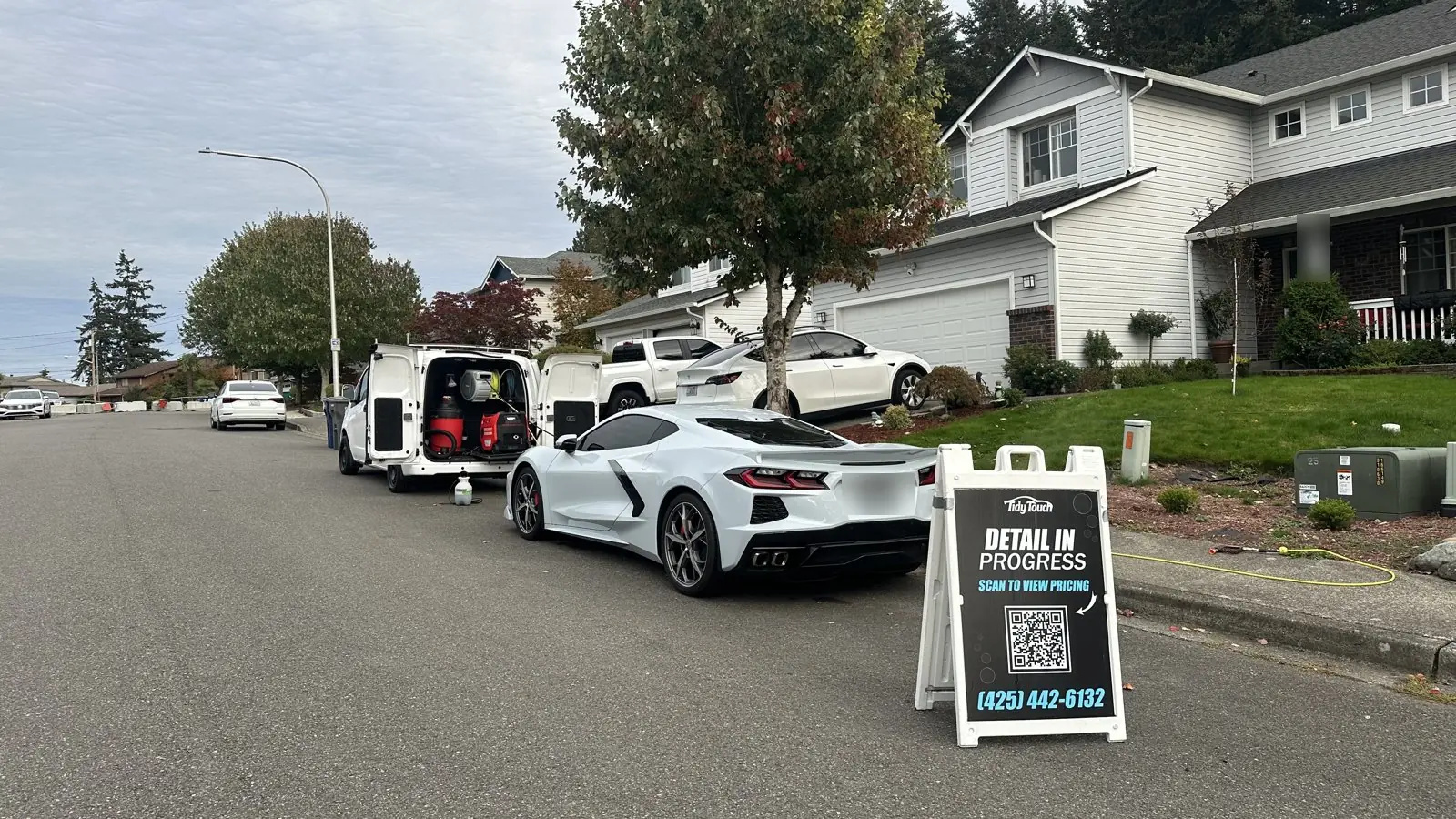 Corvette C8 parked behind the Tidy Touch van during a mobile detail